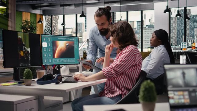 Team generating detailed videos of Mars and satellite with AI chatbot, using prompts on virtual assistant. Colleagues interact with artificial intelligence, generative models for solar system.