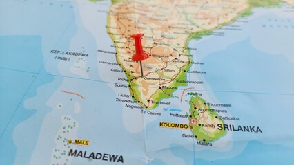 Obraz premium View of Coimbatore, also known as Kovai, is a metropolitan city in the Indian state of Tamil Nadu, on a geographical map of Asia, marked with red push pin