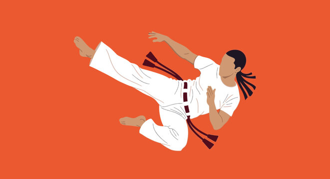 Martial arts athlete in action with dynamic kick on solid orange background