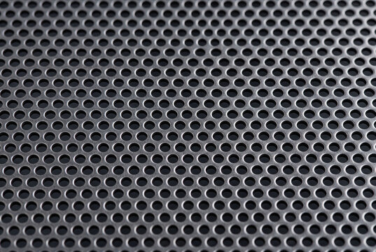 Perforated metal sheet texture with dense circular hole pattern