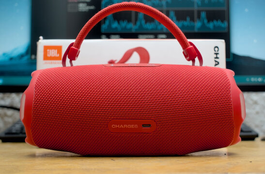 Zapopan Jalisco, Mexico - April 23, 2026: Red JBL Charge portable bluetooth speaker on desk, speaker concept