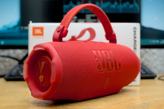Zapopan Jalisco, Mexico - April 23, 2026: Red JBL Charge portable bluetooth speaker on desk, speaker concept