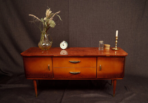 vintage furniture and accessories on a dark background
