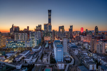Sunset over Beijing's Central Business District: A transition from the urban twilight to vibrant city nightlife © 文普 王