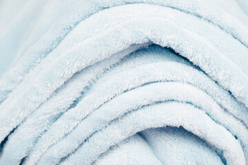 Folded Light Blue Fluffy Blanket © Jingjing Song