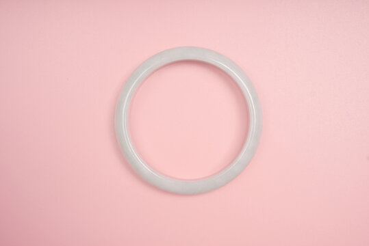 White Jade Bangle on Pink Background