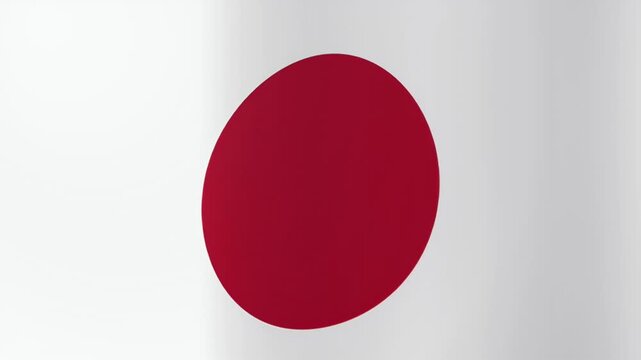 National flag of Japan with its iconic red sun on a white background waves gently in a seamless loop.