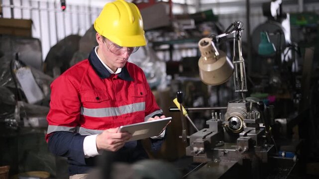 Engineer Industrial work with lathe machine operating in workshop precisely shaping metal workpiece cutting tools rotating spindle controlled movement  accuracy machining and manufacturing processes.