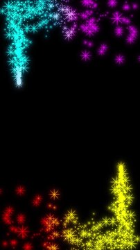 Colorful glowing particles and sparkling stars forming a vertical border frame on black background for festive holiday and celebration