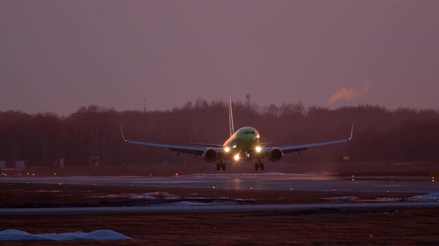 Transport passenger aircraft aviation. Airport terminal airfield. Airplane take off flight runway sunset at sky. Departure takeoff. Travel Tourism Destinations.