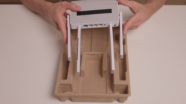Closeup tutorial demonstrating support placement in molded packaging. Comprehensive visual instructions for correctly assembling and inserting support into pulp packaging