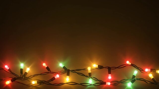 A festive string of multicolored Christmas lights illuminating a dark background, creating a warm and celebratory atmosphere for the holiday season