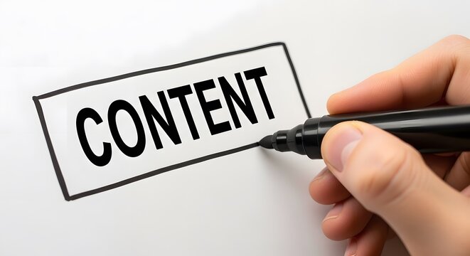 Hand writing the word content with a black marker on paper