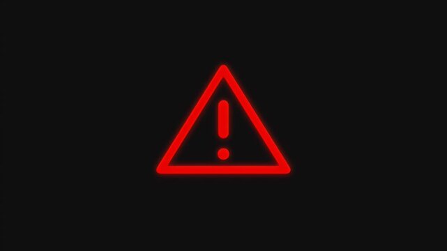 Red glowing warning triangle icon with exclamation mark flashing on a dark digital screen interface