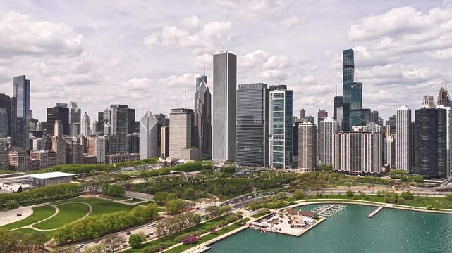 Aerial Timelapse of Chicago Skyline with Lake Michigan and Lakefront Trail on a Spring Afternoon with Moving Clouds (April 23, 2026)