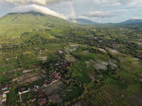 Aerial View of Banten Rice Terraces with Rainbow and Mountain Landscape