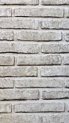 Fototapeta premium Vertical White Brick Wall Texture Background, Minimal Rough Surface Pattern for Design