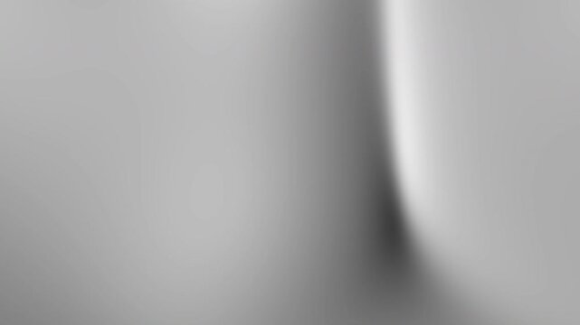 Abstract gradient of light and shadow, ideal for backgrounds, presentations, and design projects needing a modern touch of simplicity.