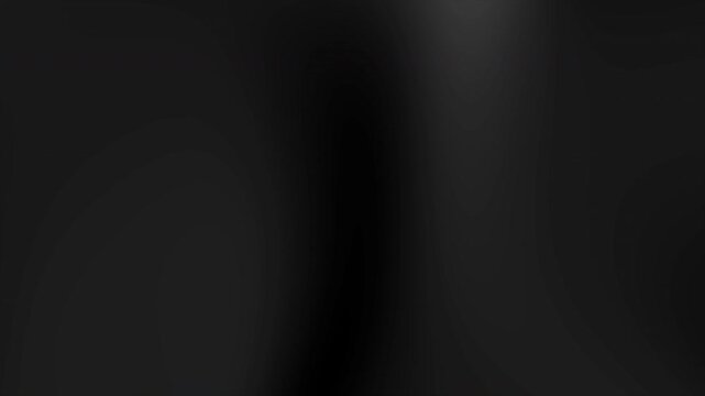 Abstract black background suitable for text overlays, minimalist designs, or creating suspenseful and mysterious atmospheres in various graphic projects.