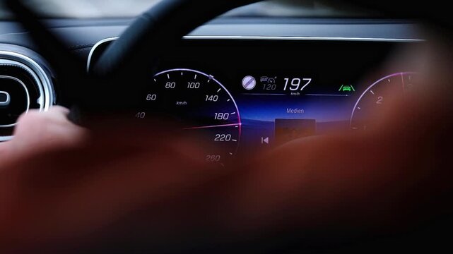 A man drives his car very fast on the Autobahn in Germany