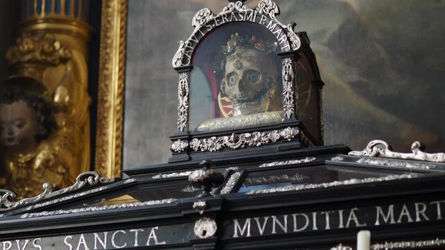 Ornate skeleton relic of Saint Munditia decorated with jewels inside St. Peter's Church, Munich.