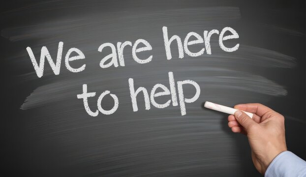 Hand writing we are here to help message on chalkboard
