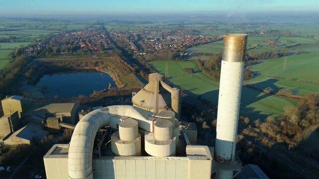 Aerial perspective of modern heavy industry and building material manufacturing in the UK.