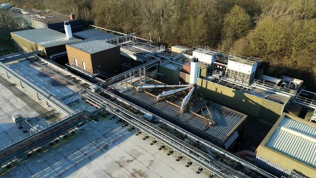 Wide aerial landscape of a cloud storage data centre situated within an industrial estate in the UK.