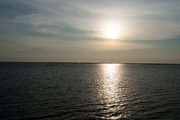 Obraz premium Tranquil view of sunset over calm sea in Thailand