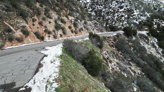 The Santa Ana River Valley in San Bernardio, California, after a winter storm near State Route 38 looking at the Road to Big Bear near Angelus Oaks 