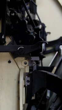Inside mechanism of printing machine in the printing house, close up