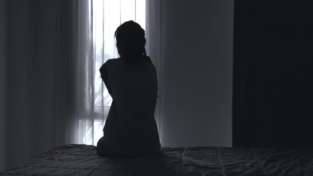 The slow-motion video shows a woman suffering from depression at home, experiencing insomnia,  depression, hopelessness, boredom, and a lack of enjoyment in things she used to love.