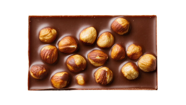 Dark chocolate bar with whole hazelnuts embedded, isolated on transparent background
