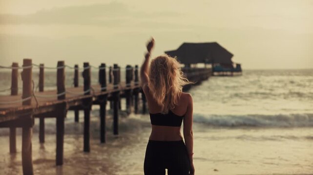 Sportswoman Feeling Freedom and Vitality During Evening. Motivation and Inspiration for Outdoor Sport