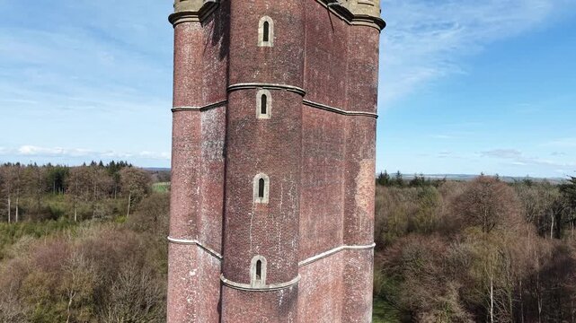 Ascending drone aerial view Alfred's Tower folly in Somerset, England 4K