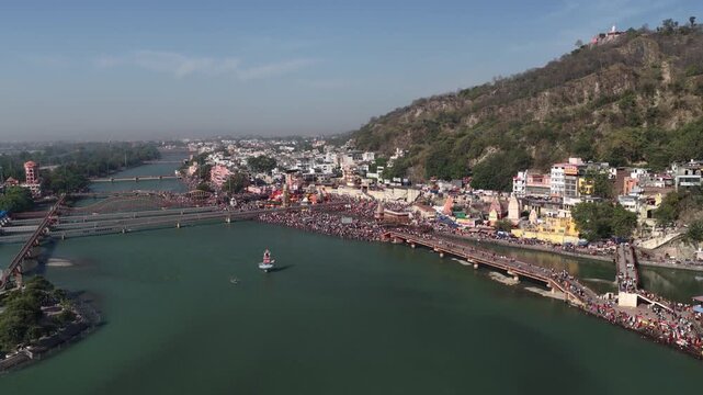 Aerial view wide angle of har ki pauri haridwar at daytime, 6k 60 fps footage 