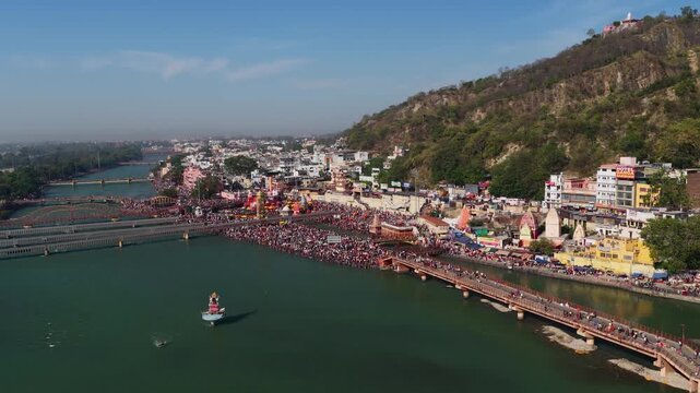 har ki pauri haridwar with massive pilgrim crowd captured with drone at daytime.