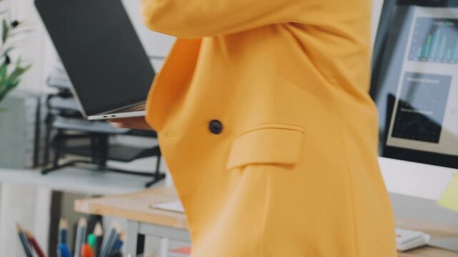 Business woman accountant working in office checking financial accounts and allocating company budgets.