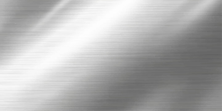 Polished silver stainless steel plate with a brushed metal texture featuring a shiny metallic surface and light gray industrial pattern for a sleek material backdrop