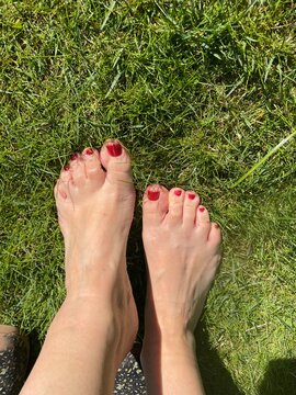feet on the grass