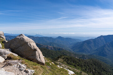 Fototapeta premium Mountain peaks and valleys with sky over Ghisoni, Corsica