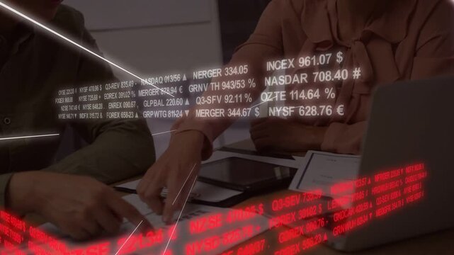Ticker scrolling, pair leaning, pointing at charts, tracing numbers and comparing figures