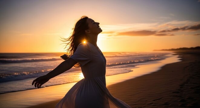 Woman embracing the sunset on a serene beach feeling free.