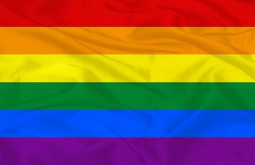 Obraz premium LGBT Rainbow Pride Flag Waving Fabric Background