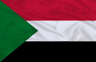 Obraz premium Sudan National Flag Waving Fabric Background