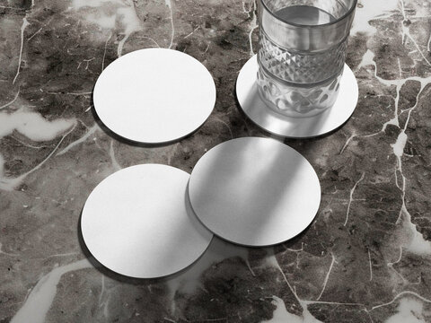 White Blank Round Coaster Mockup on a Marble Table with  a Glass of Water 3D Rendering