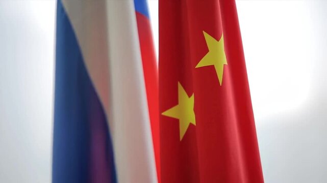 Russia and China Flags Waving Together Symbol of Global Cooperation