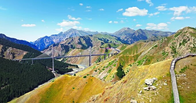 Aerial view of Guozigou cable-stayed bridge in the mountain valley, Xinjiang, China.