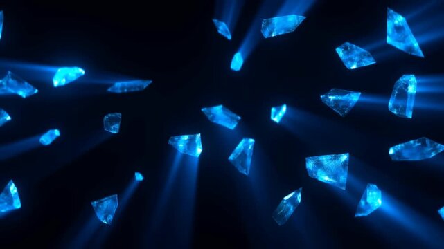Slow motion tracking shot of glowing blue crystals floating and scattering through dark void with light rays and reflective facets