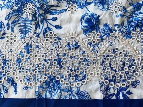 White Thread Floral Cutwork Embroidery Border on Blue Printed Cotton Fabric